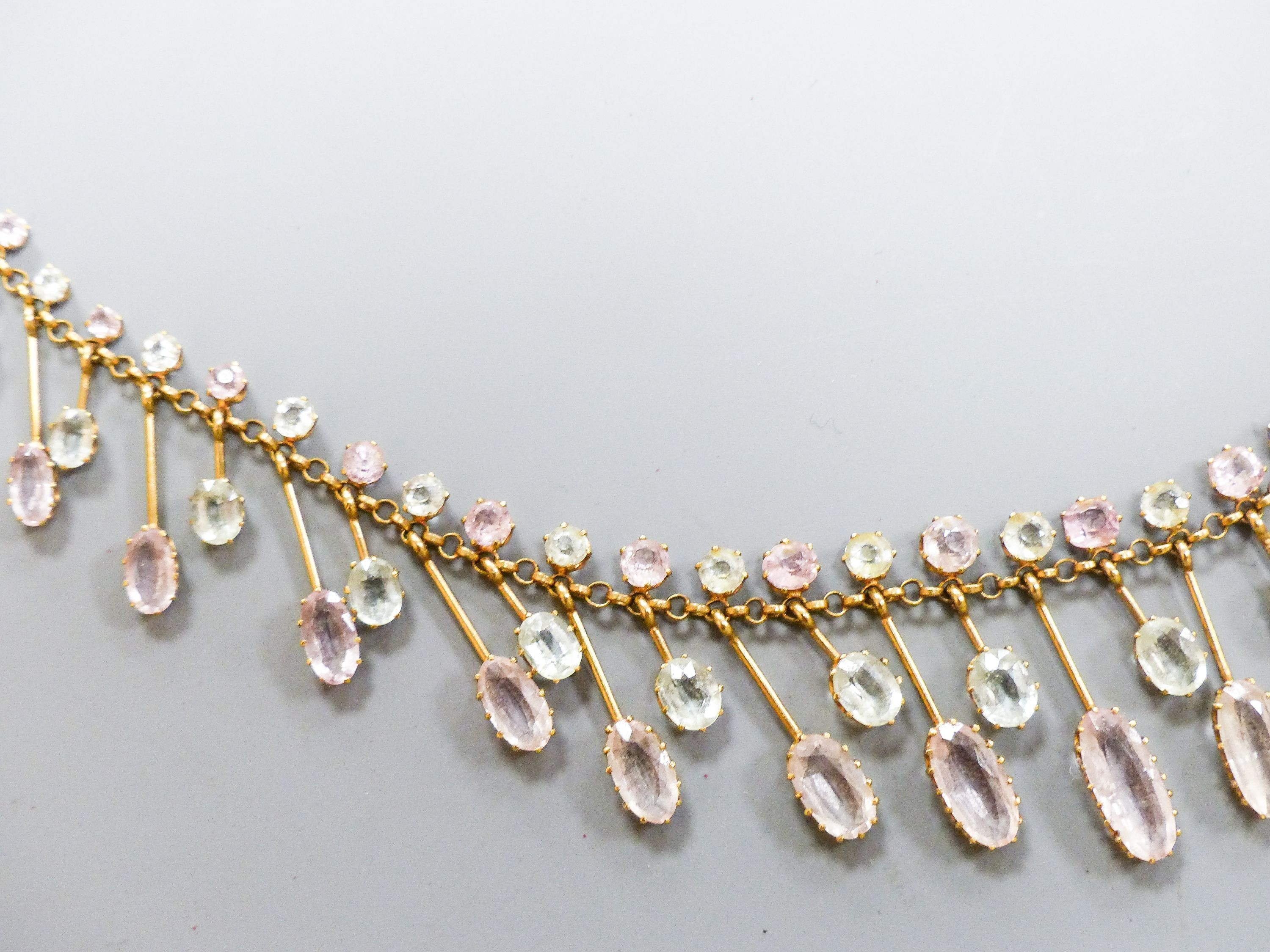 A 9k, aquamarine and pink topaz set drop fringe necklace, approx. 46cm